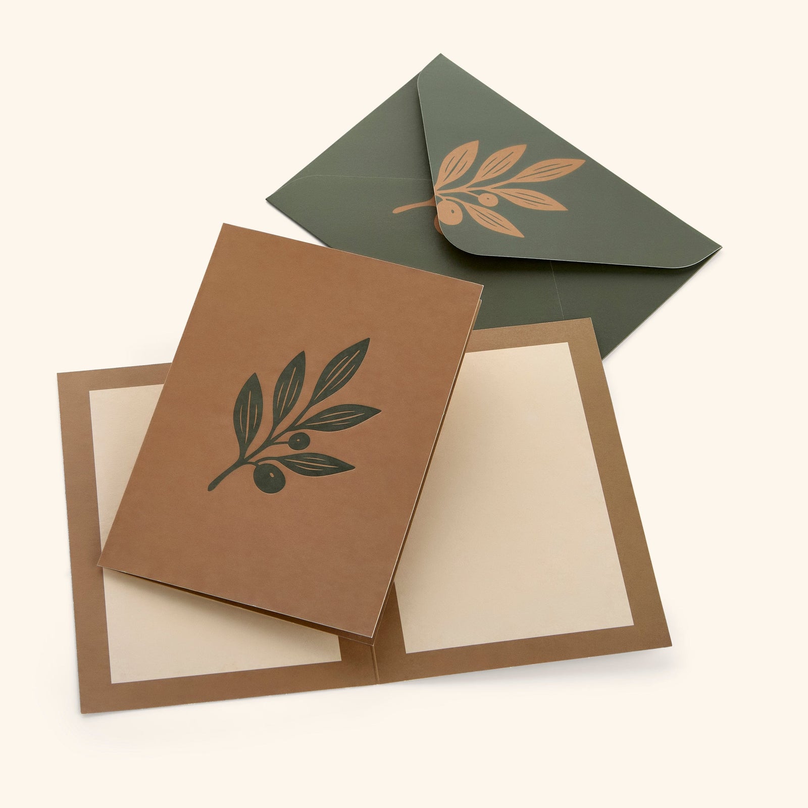 In the photo: closed Olive Branch Greeting Card, blank inside of the card, and card envelope. 
