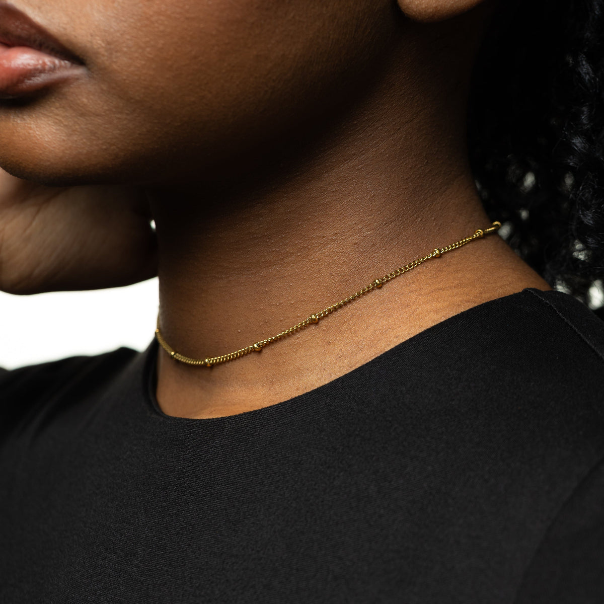 Close up of the Dotted Chain Choker as worn by the model.