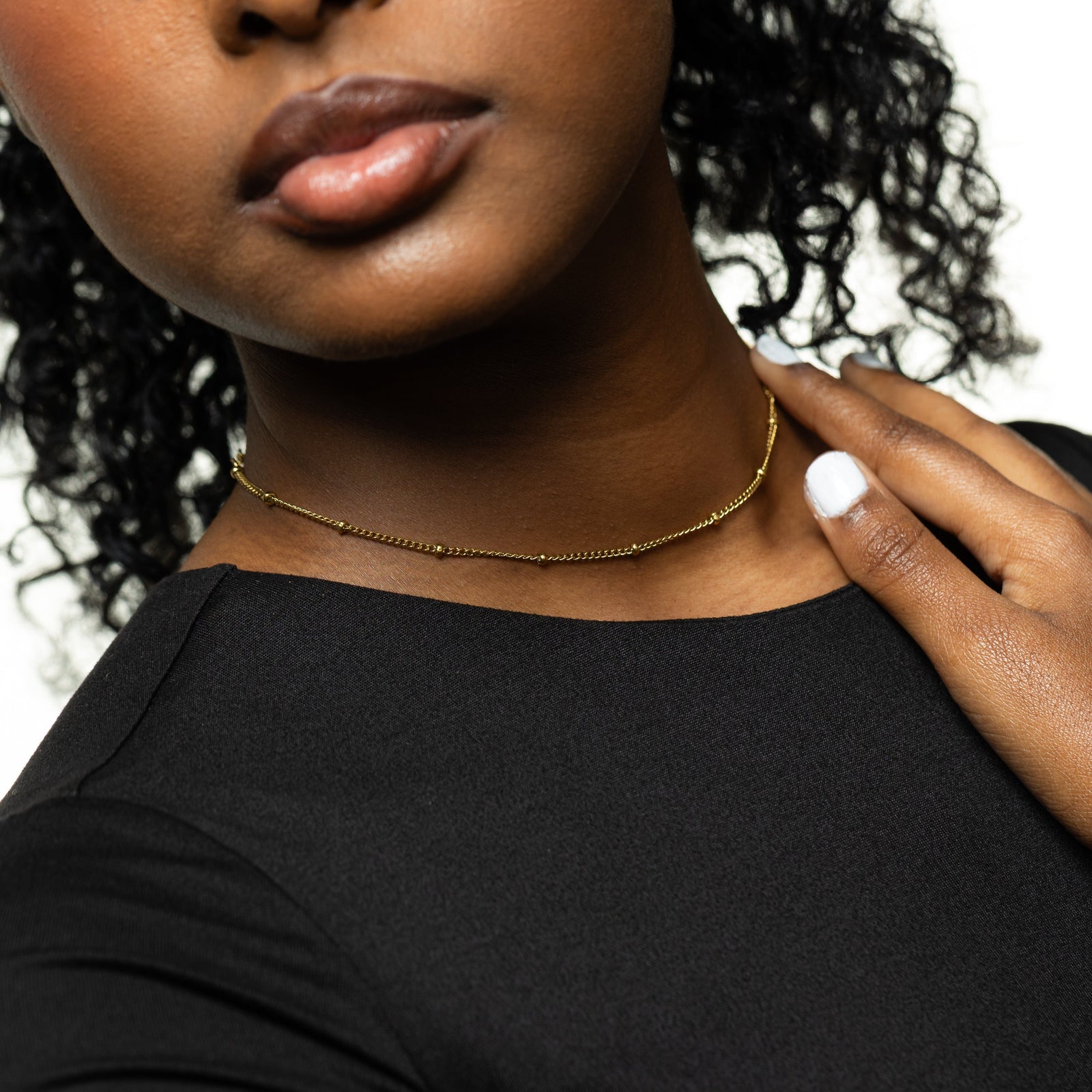 Close up of the Dotted Chain Choker as worn by the model.