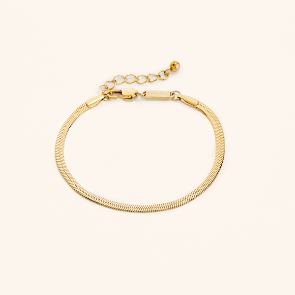 Photo of the 18k gold plated bracelet that features interlocked slanted links in a style that dates back to Ancient Egypt.