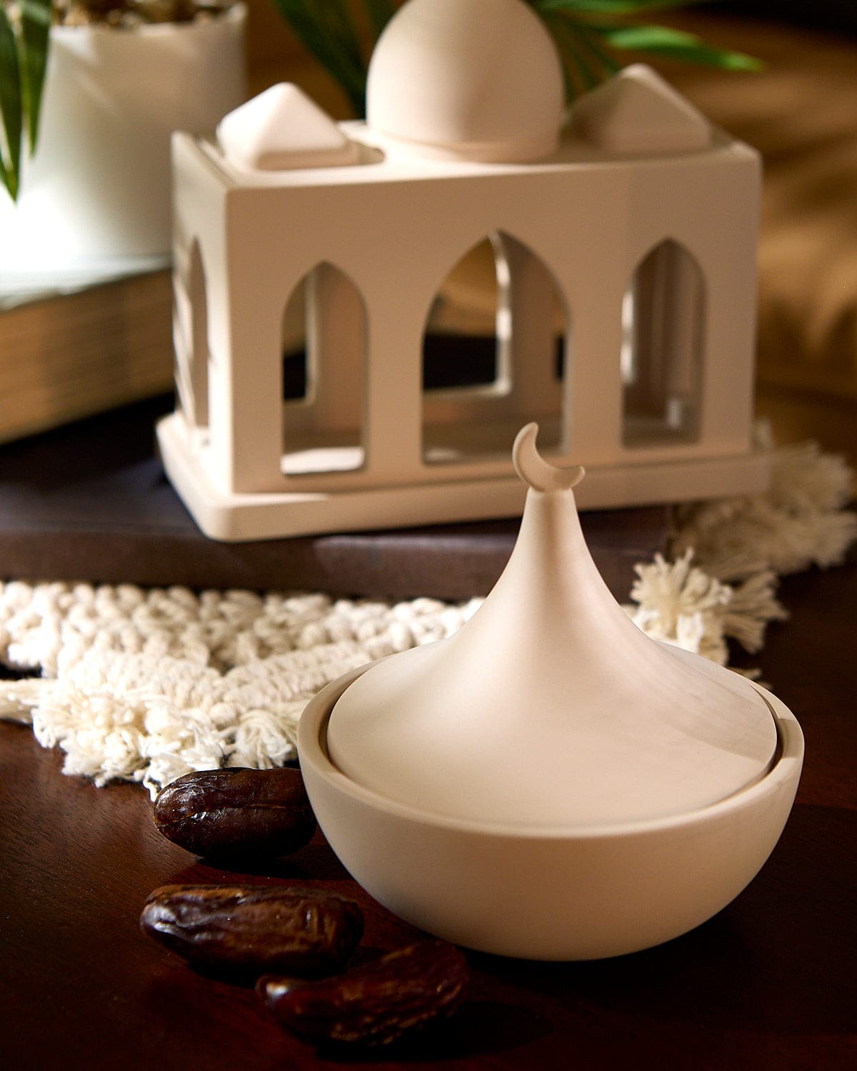 Photo of the Crescent Hosting Bowl displayed on top of a table.