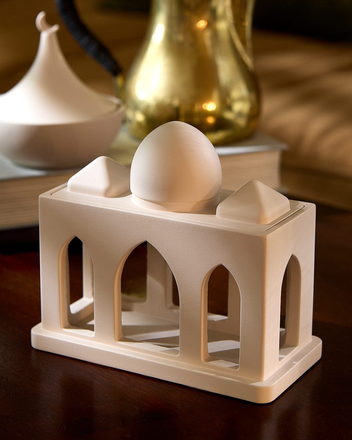 Close up of the Masjid Corridor Decorative Sculpture as displayed on a table.