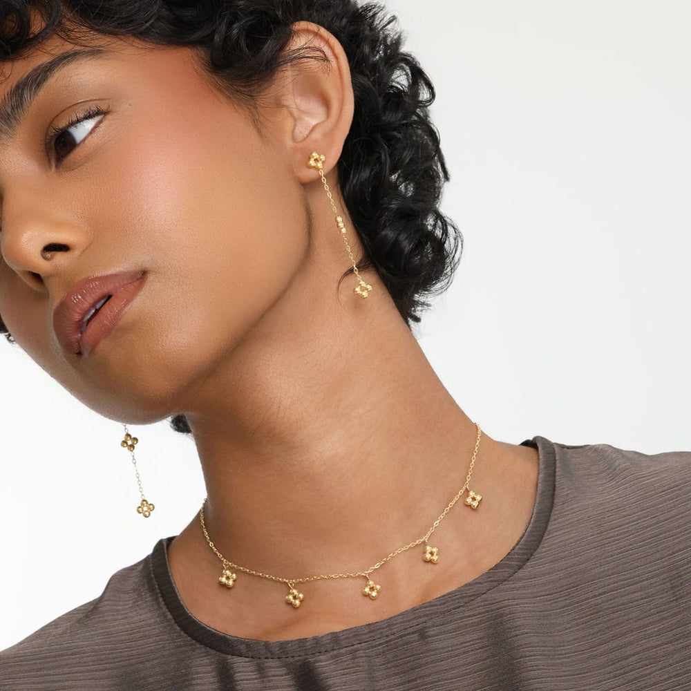 Close up of the model wearing the gold Henna Choker