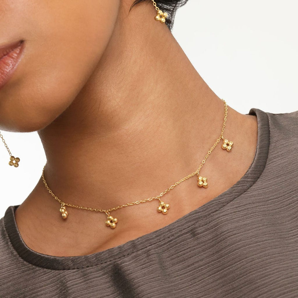 Close up of the gold Henna Choker as worn by the model.