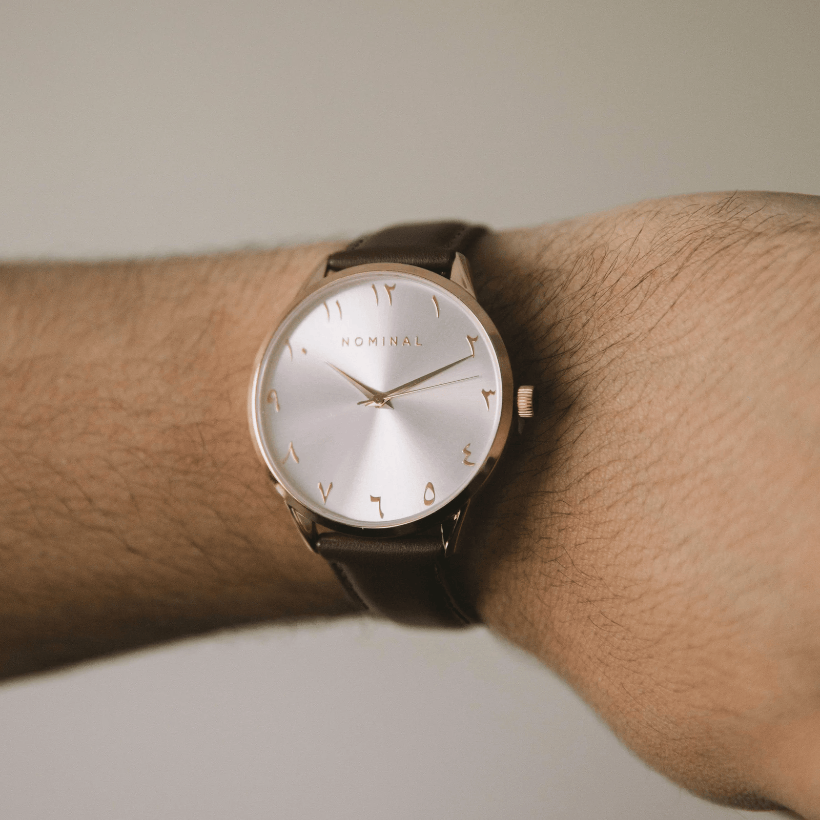 Close up of the Voyage watch as worn by the model on their left wrist.