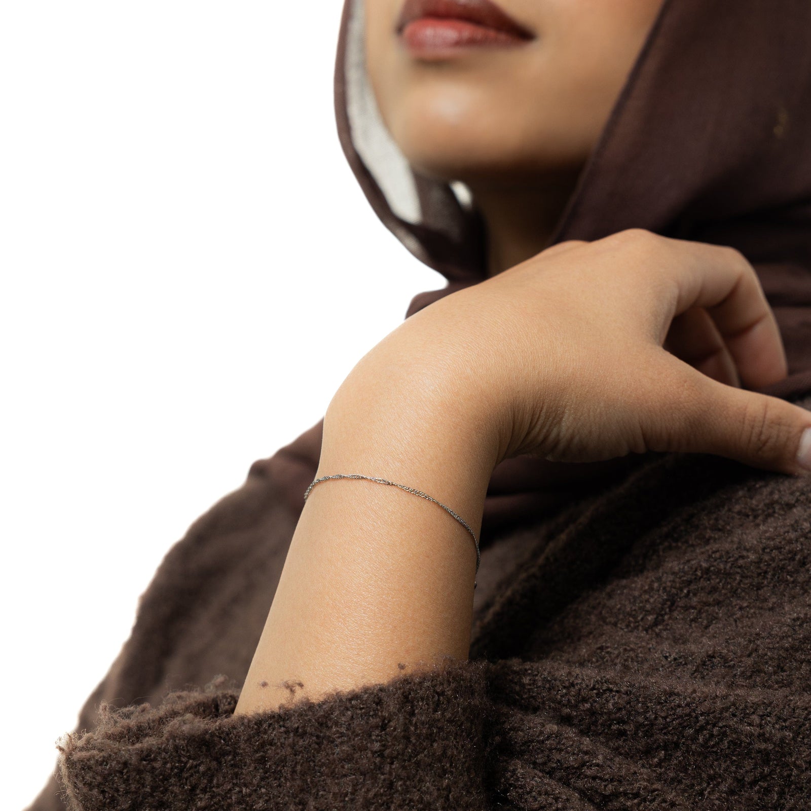 Photo of the model wearing the silver Micro Twisted Bracelet.
