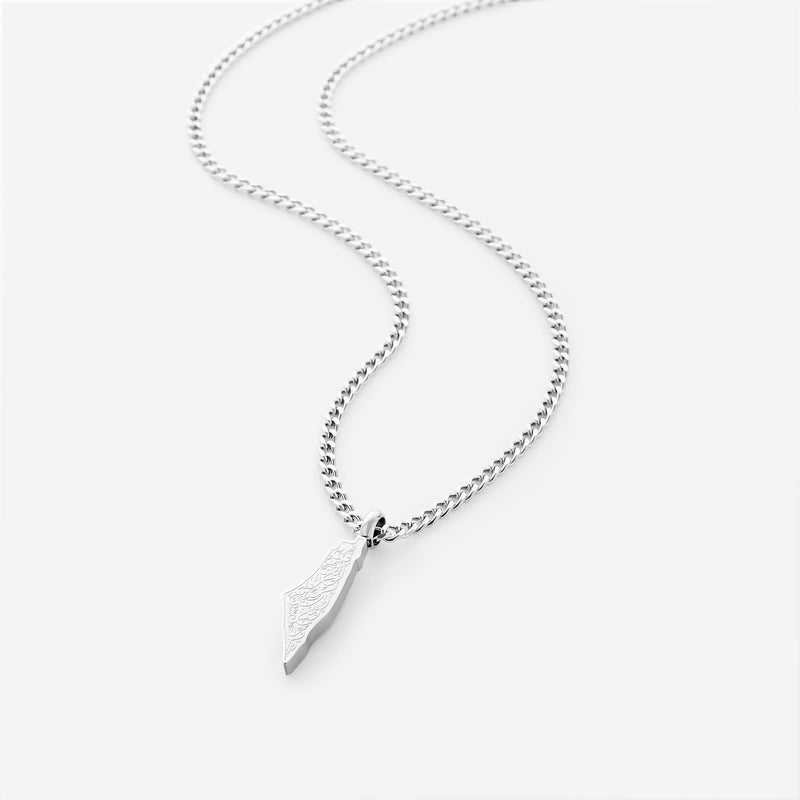Silver necklace with a palestine map-shaped pendant with arabic calligraphy engraved pimage_ shot on a white background