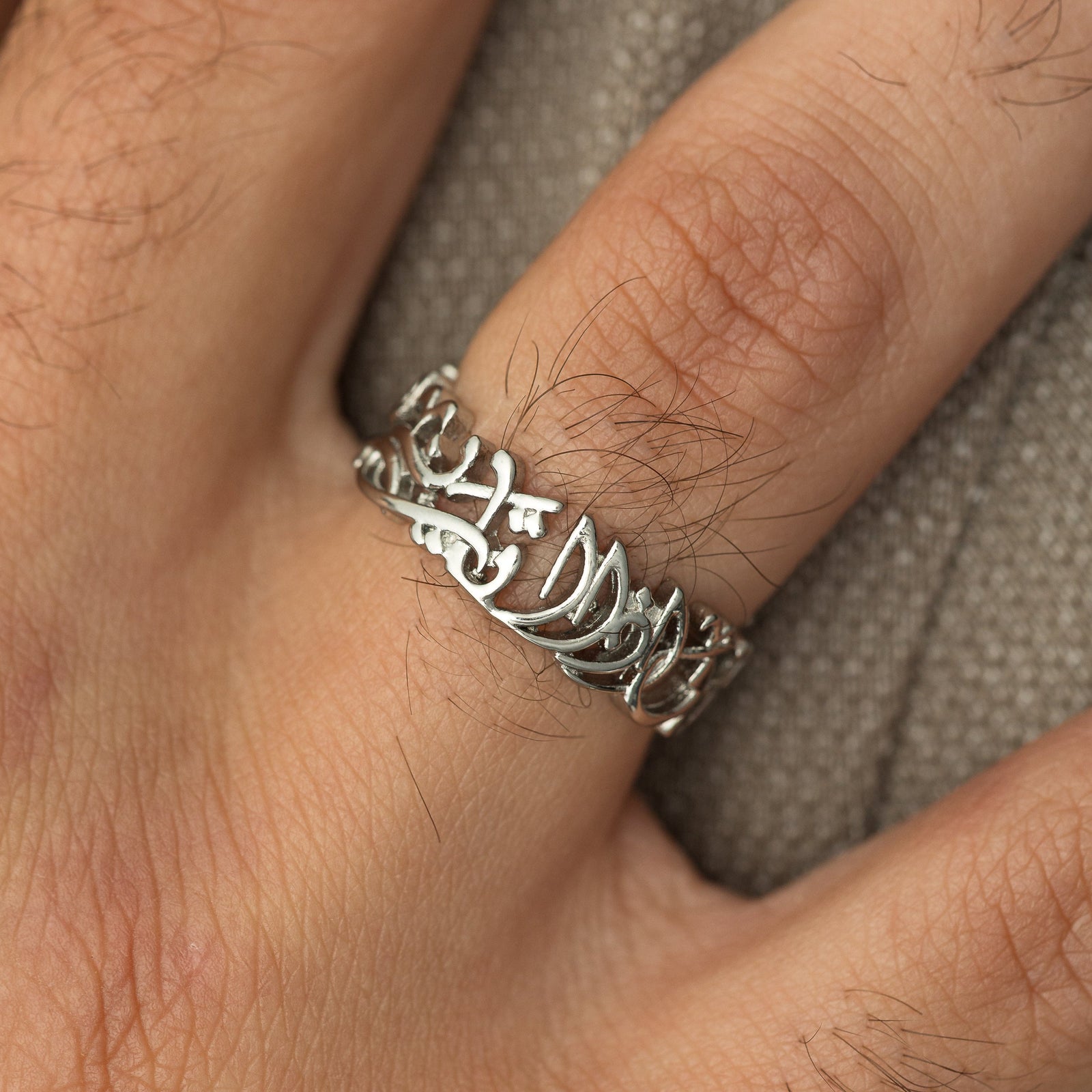 Close up of the ring as worn by the model.