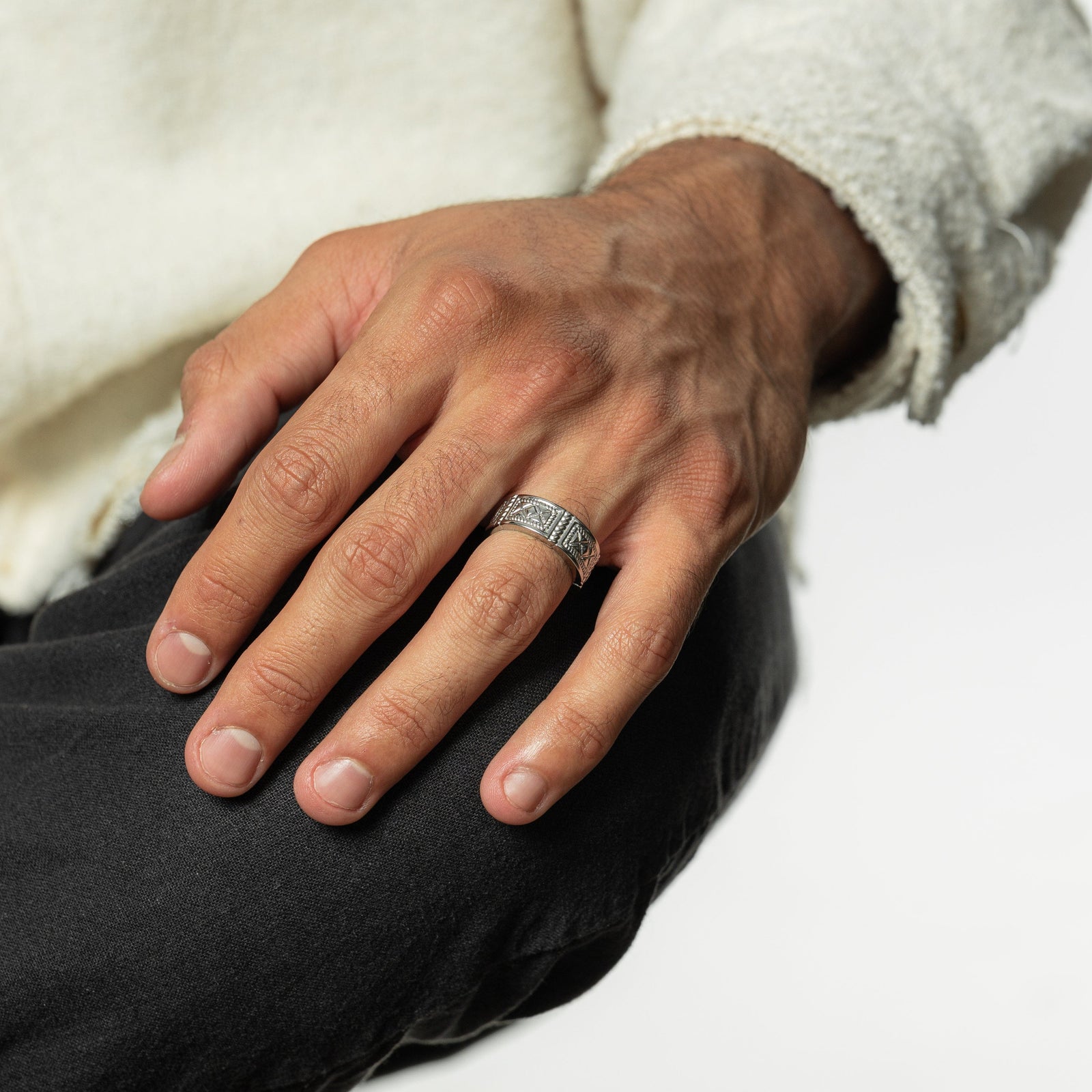 Man wearing the silver Damascus Tile Ring