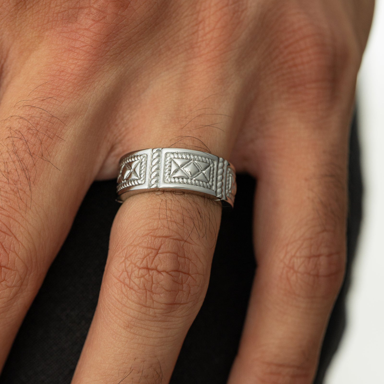 Man wearing the silver Damascus Tile Ring