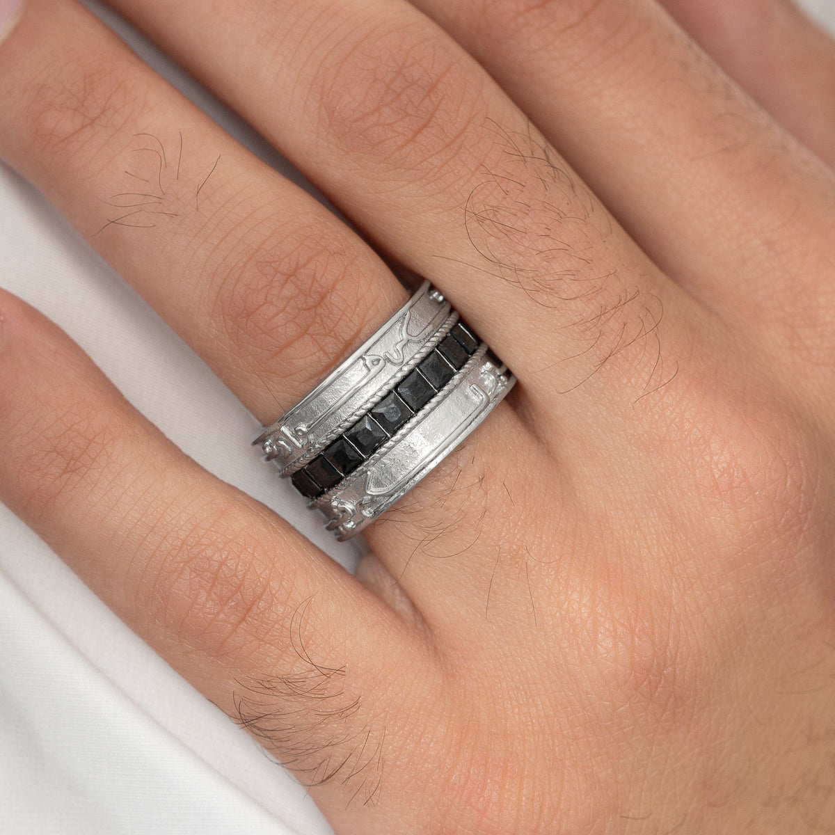 Close up of the silver "Perhaps you dislike what's good for you" Stripe Ring | Men as worn by the model.