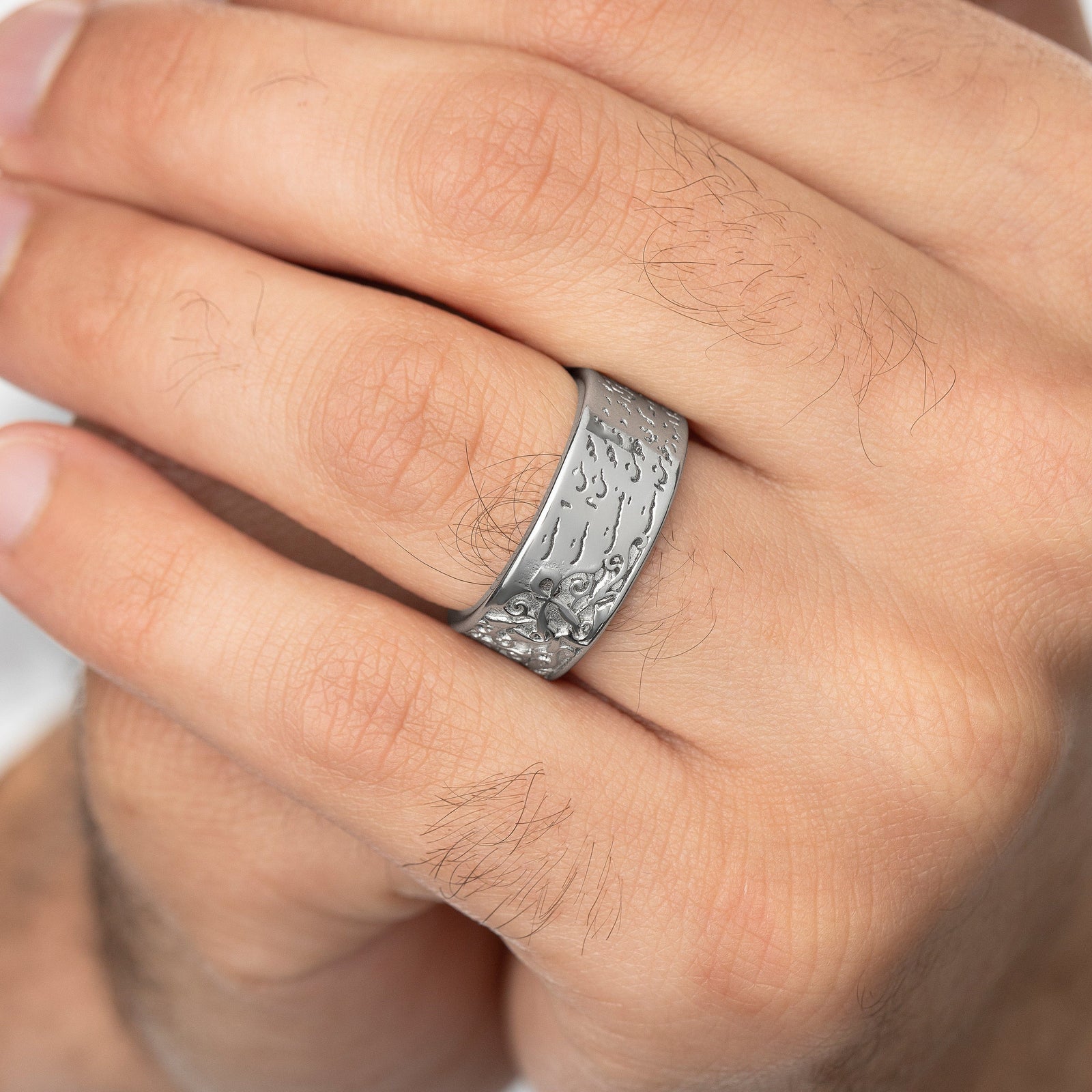 Close up photo of the ring as worn by the model.