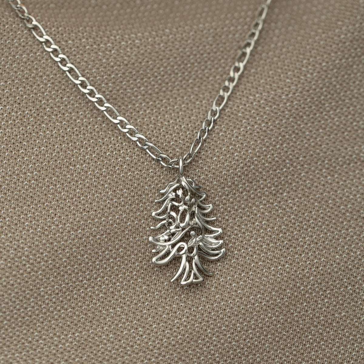 Silver ‘Freedom is the Soul’ Lebanon Cedar Necklace | Men with a detailed cedar tree pendant on a silver chain.