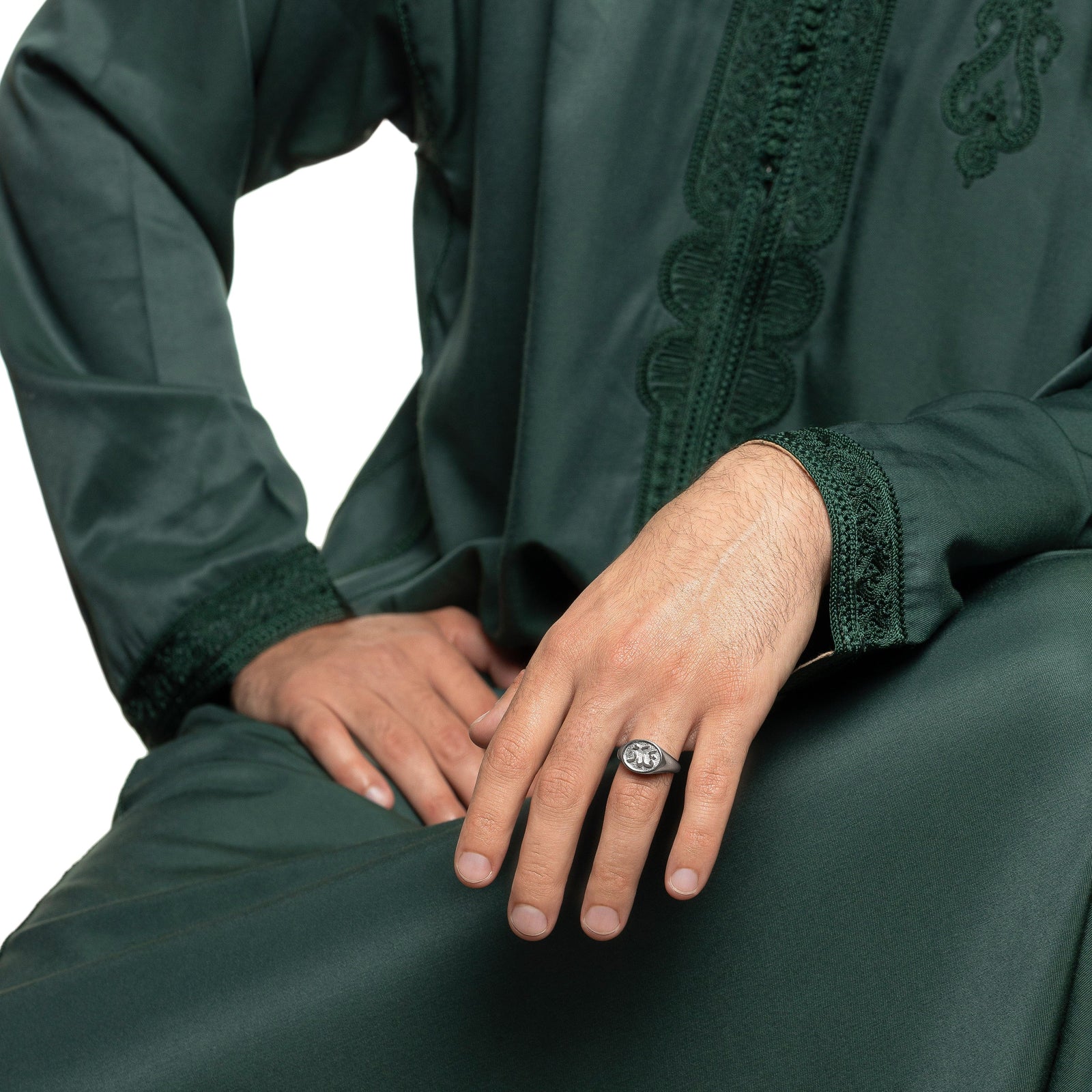 Photo of the model wearing the silver Qadr | Destiny Ring | Men on their left ring finger.
