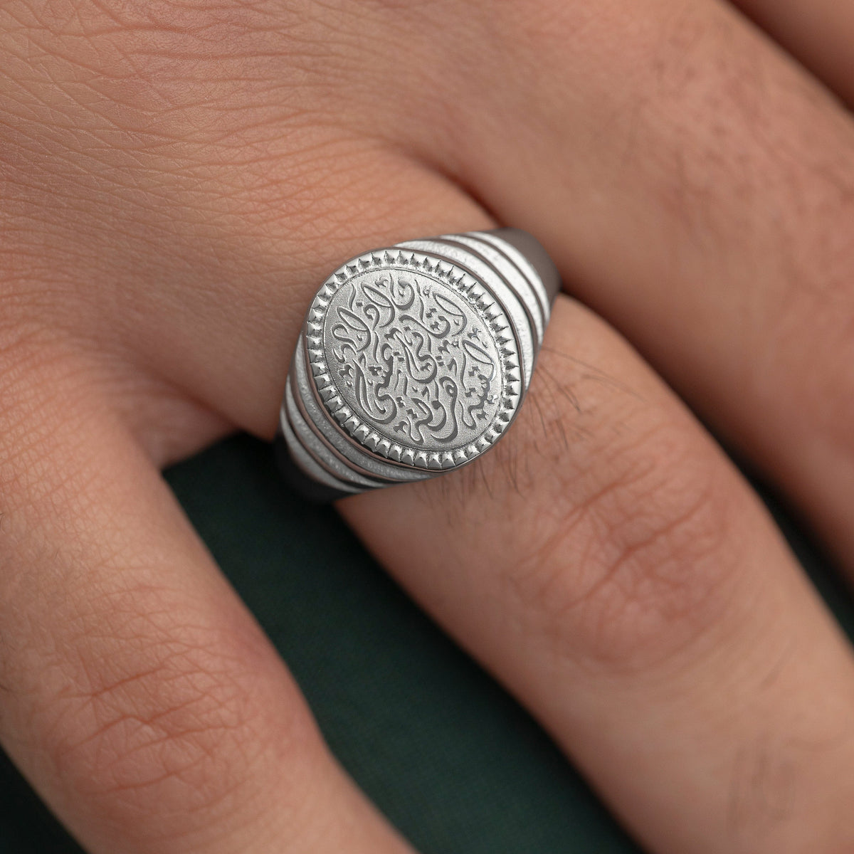 Close up of the ring as worn by the model.