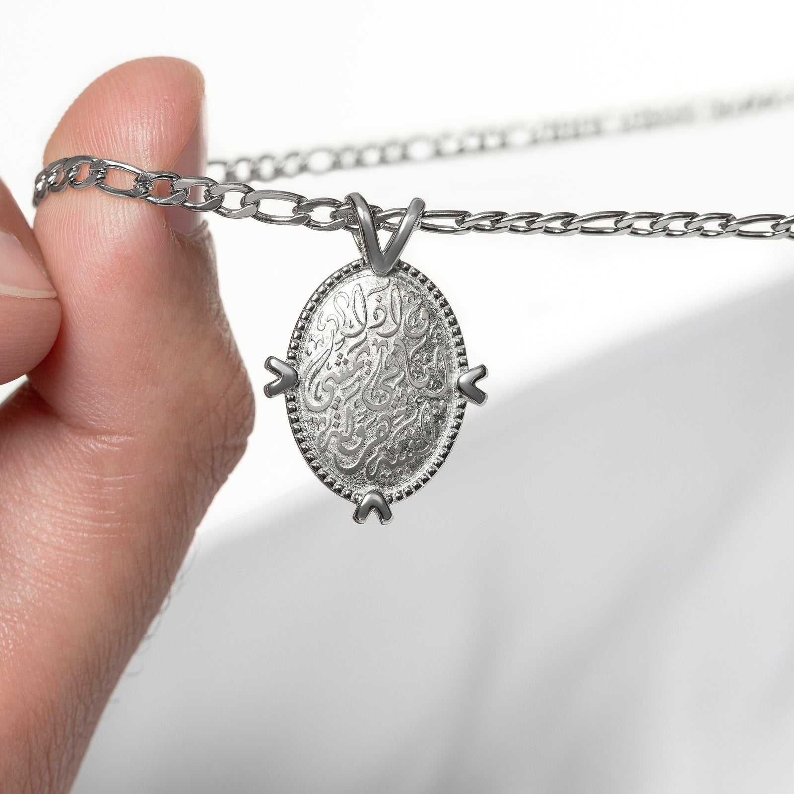 Close up of the pendant of the silver Walk to Me, and I'll run to you Medallion Necklace | Men.
