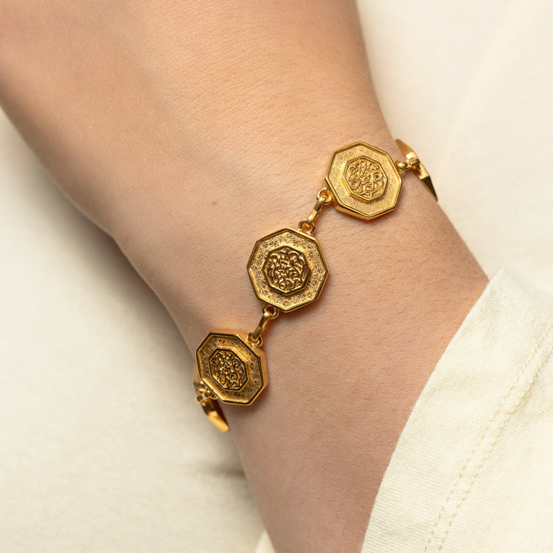 Close-up of the “Our Roots Run Deep” Dotted Bracelet in gold.