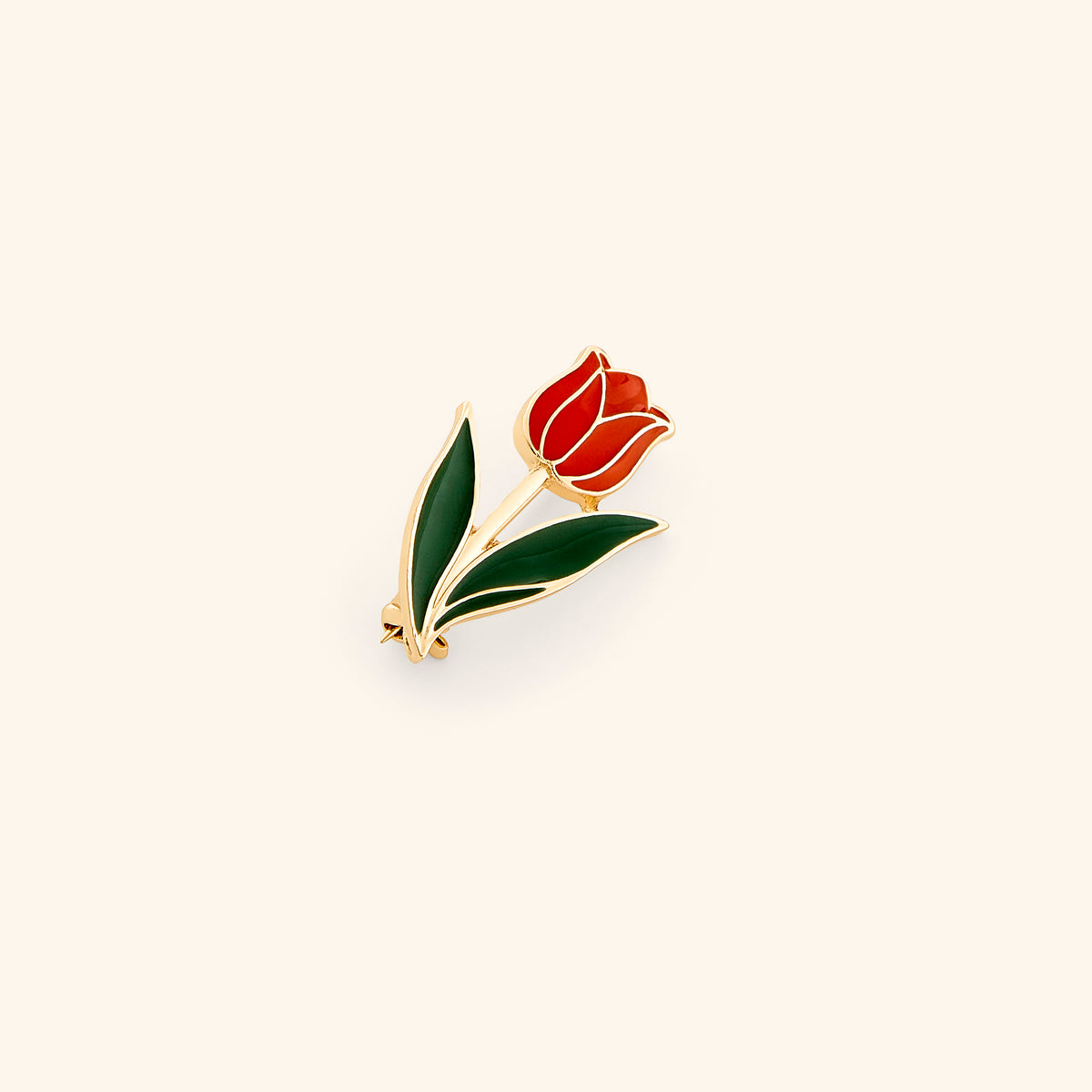 18k gold-plated Blooming Tulip Pin set on a light background. 