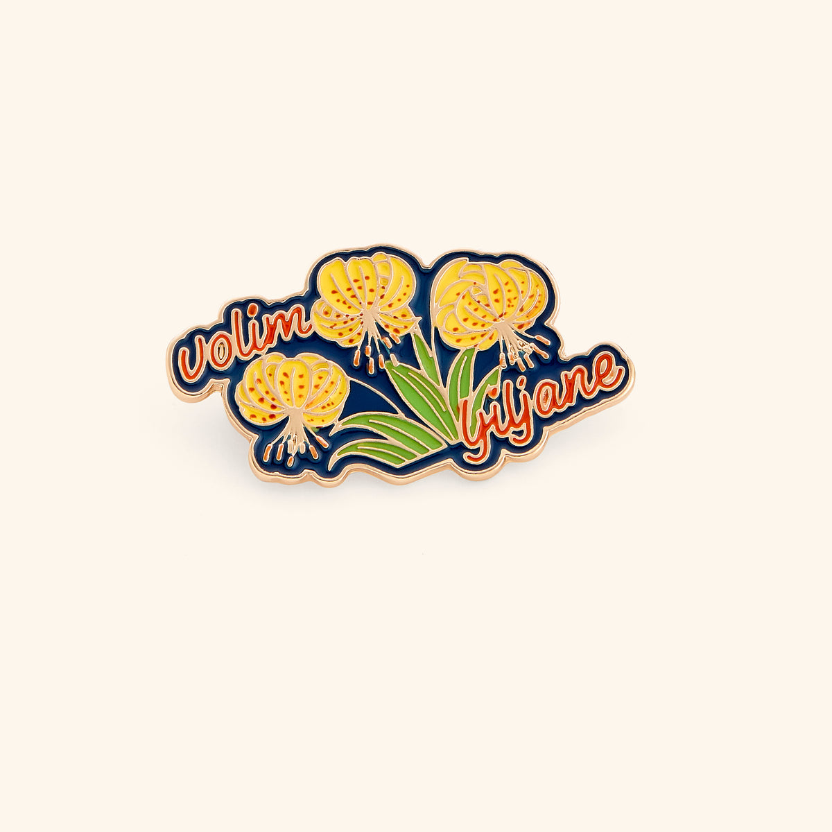 18k gold-plated Bosnia Lily Pin set on a light background. 