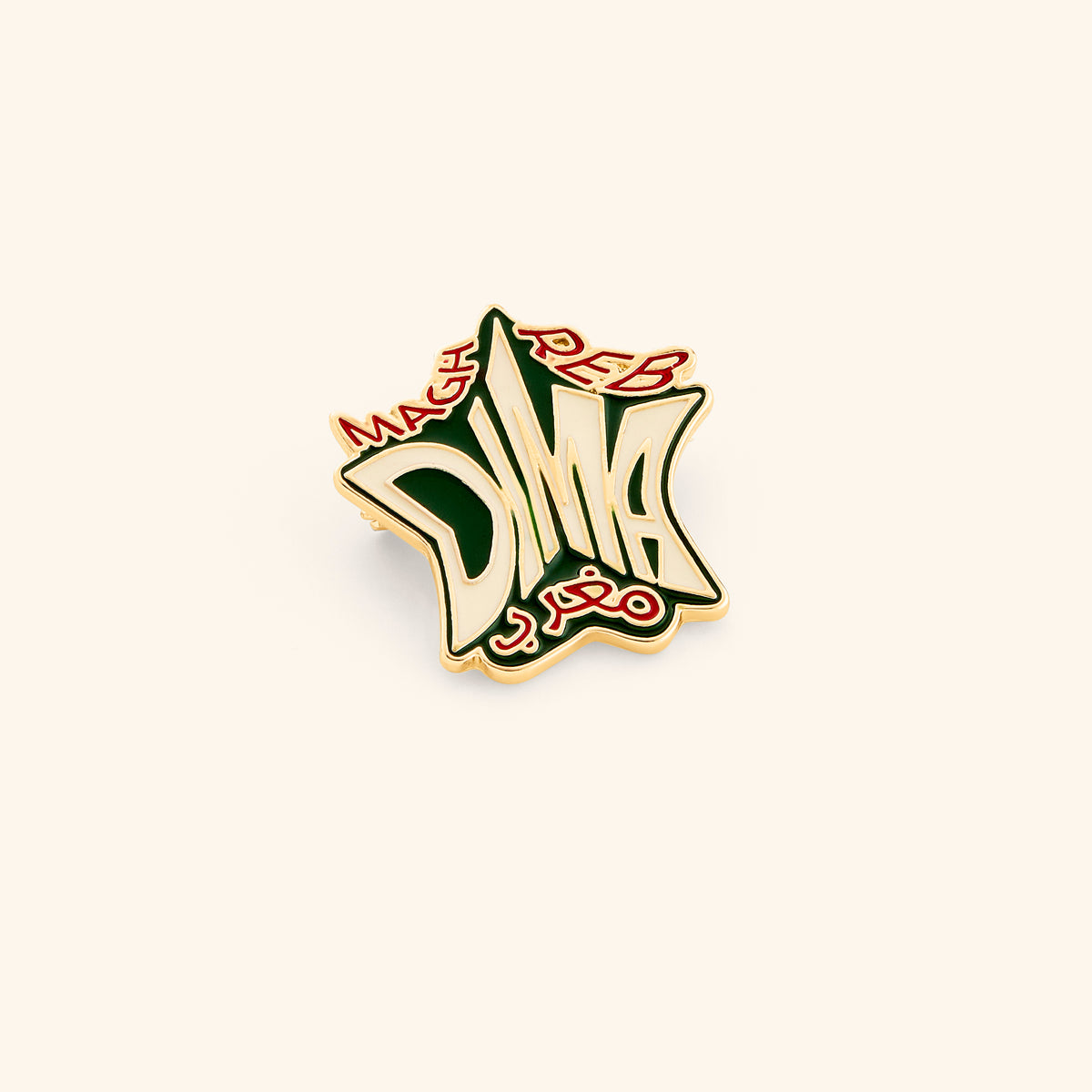 18k gold-plated Dima Maghreb Pin set on a light background. 