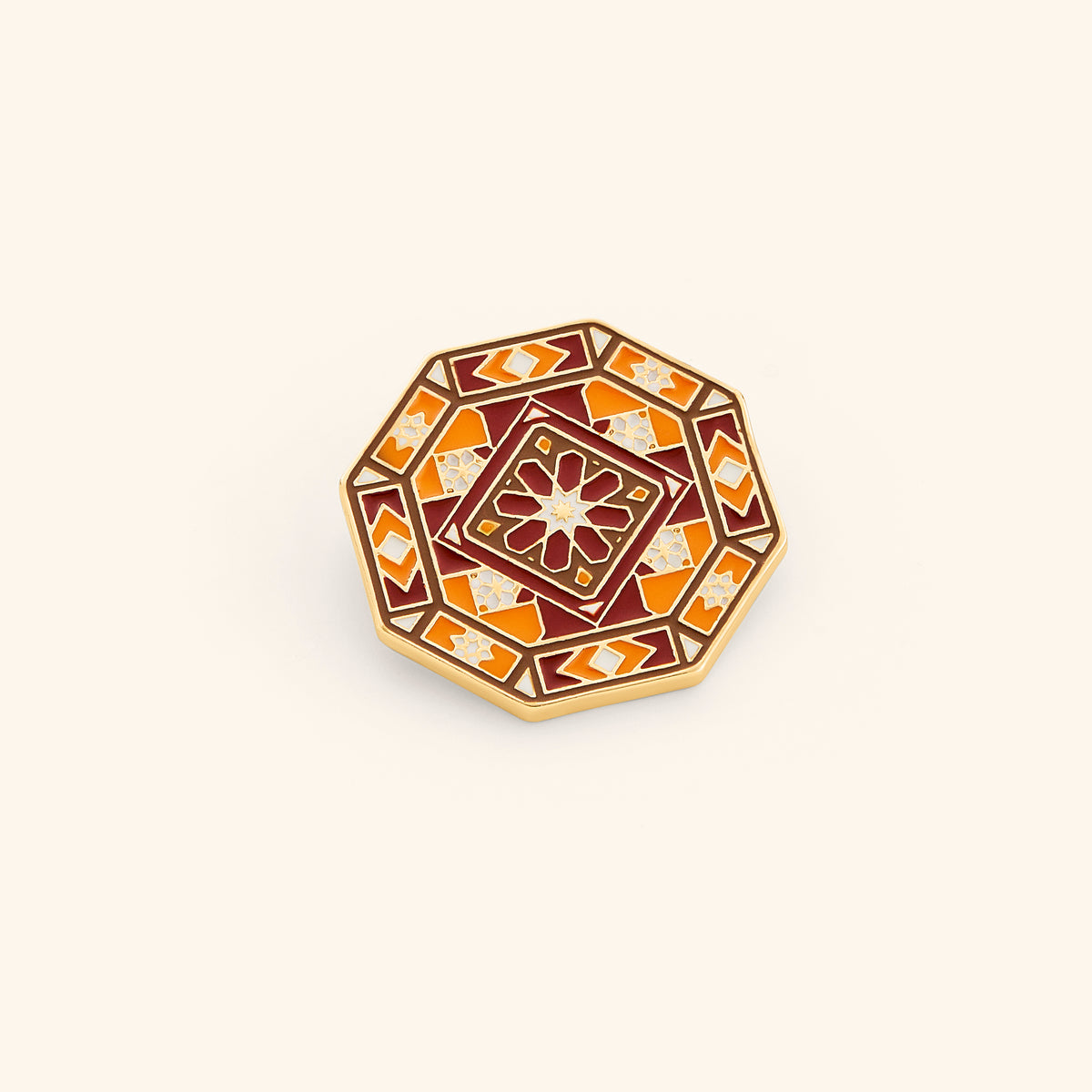 18k gold-plated Damascus Tile Pin set on a light background. 