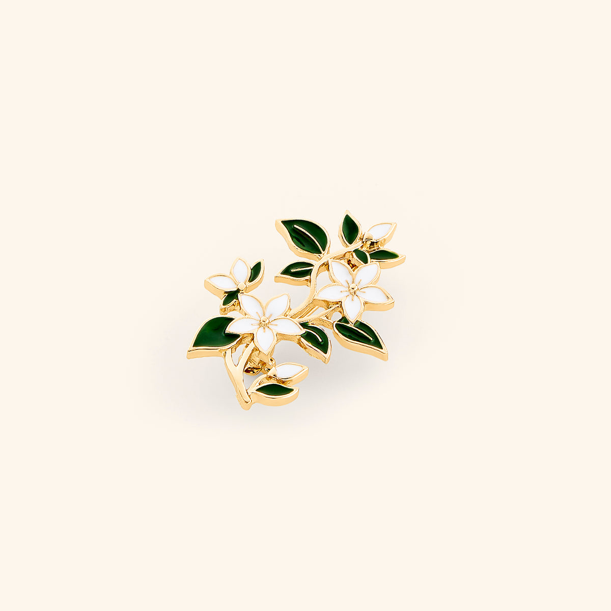 18k gold-plated Jasmine Vine Pin set on a light background. 