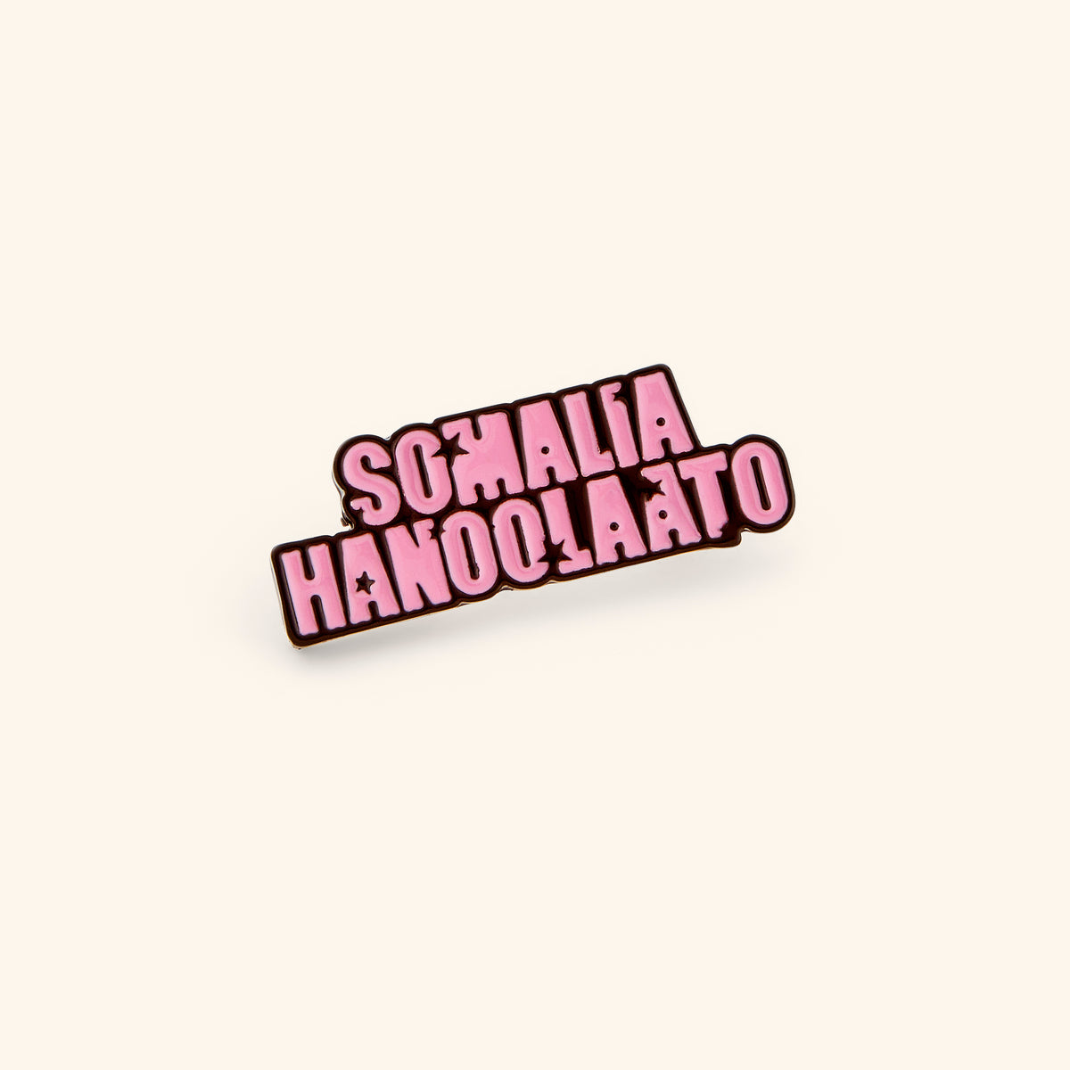 18k gold-plated Long Live Somalia Pin set on a light background. 