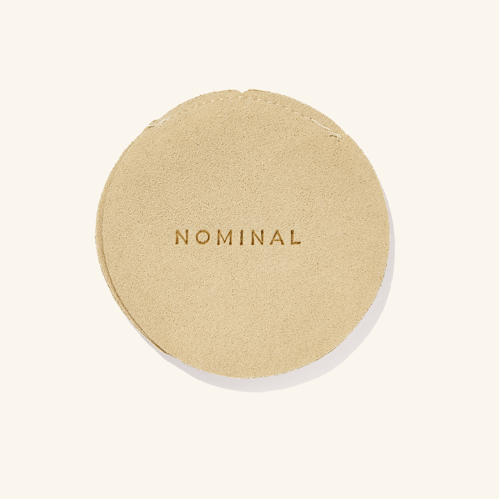 Nominal's signature velvet pouch