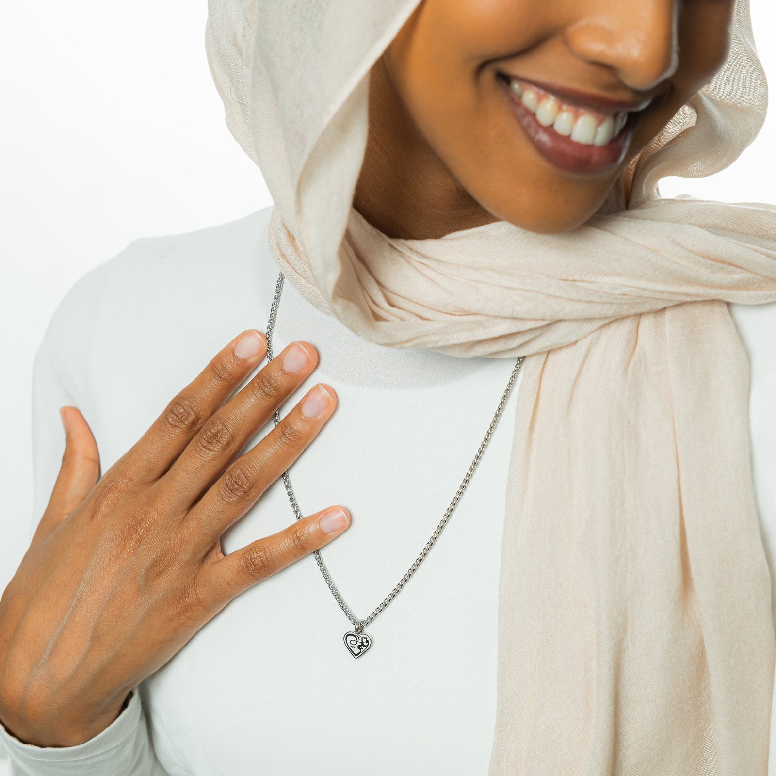 "Piece of Me" Daughter Necklace in silver as worn by the model.
