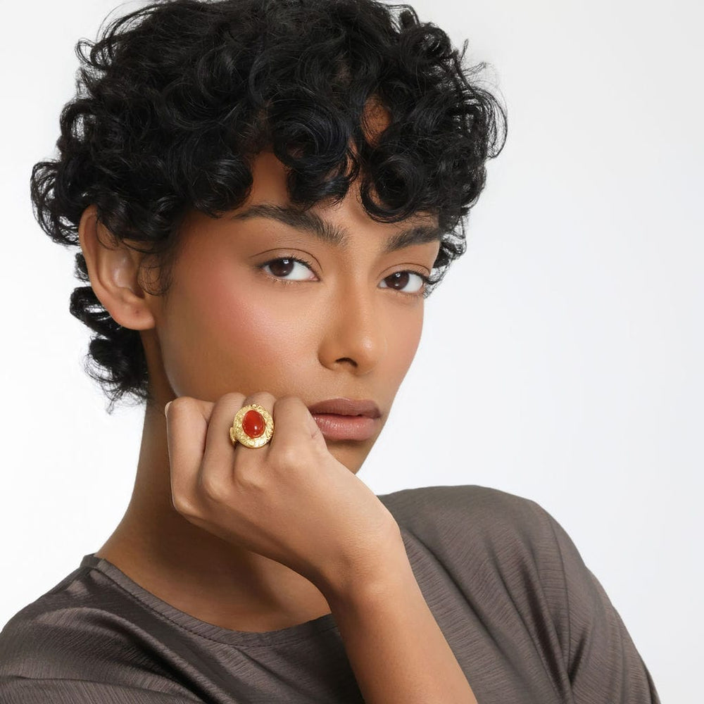 The "Roots Don't Fade" Stone Ring as worn by the model on their right ring finger.