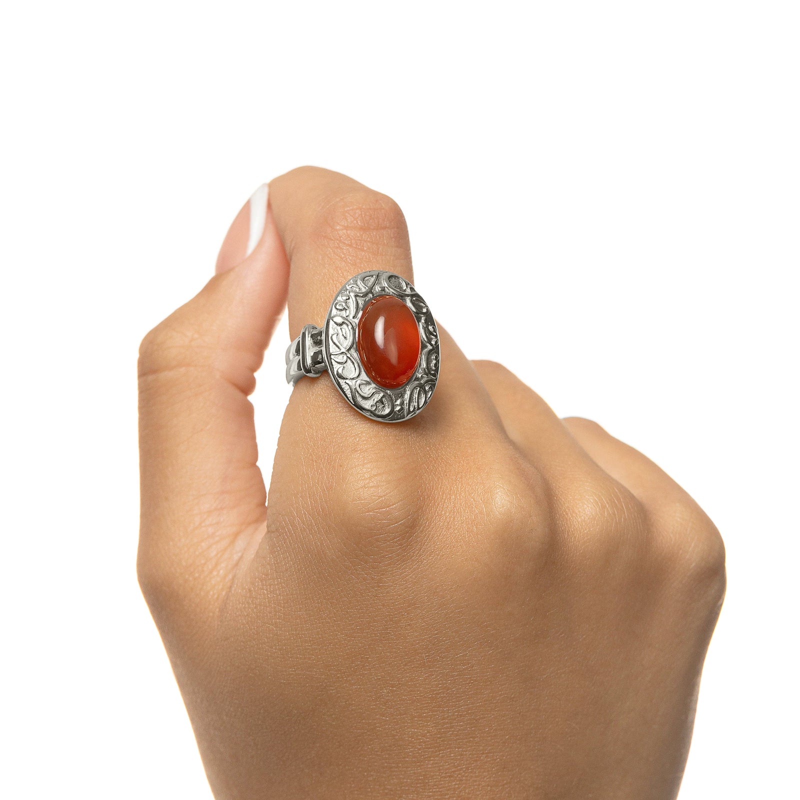 Hand wearing the Roots Don’t Fade Stone Ring in silver