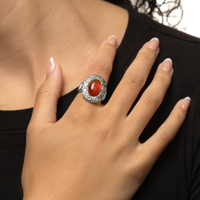 Hand wearing the Roots Don’t Fade Stone Ring in silver