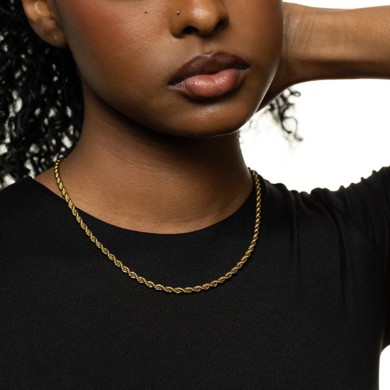 close up of the gold Rope Chain Necklace as worn by the model