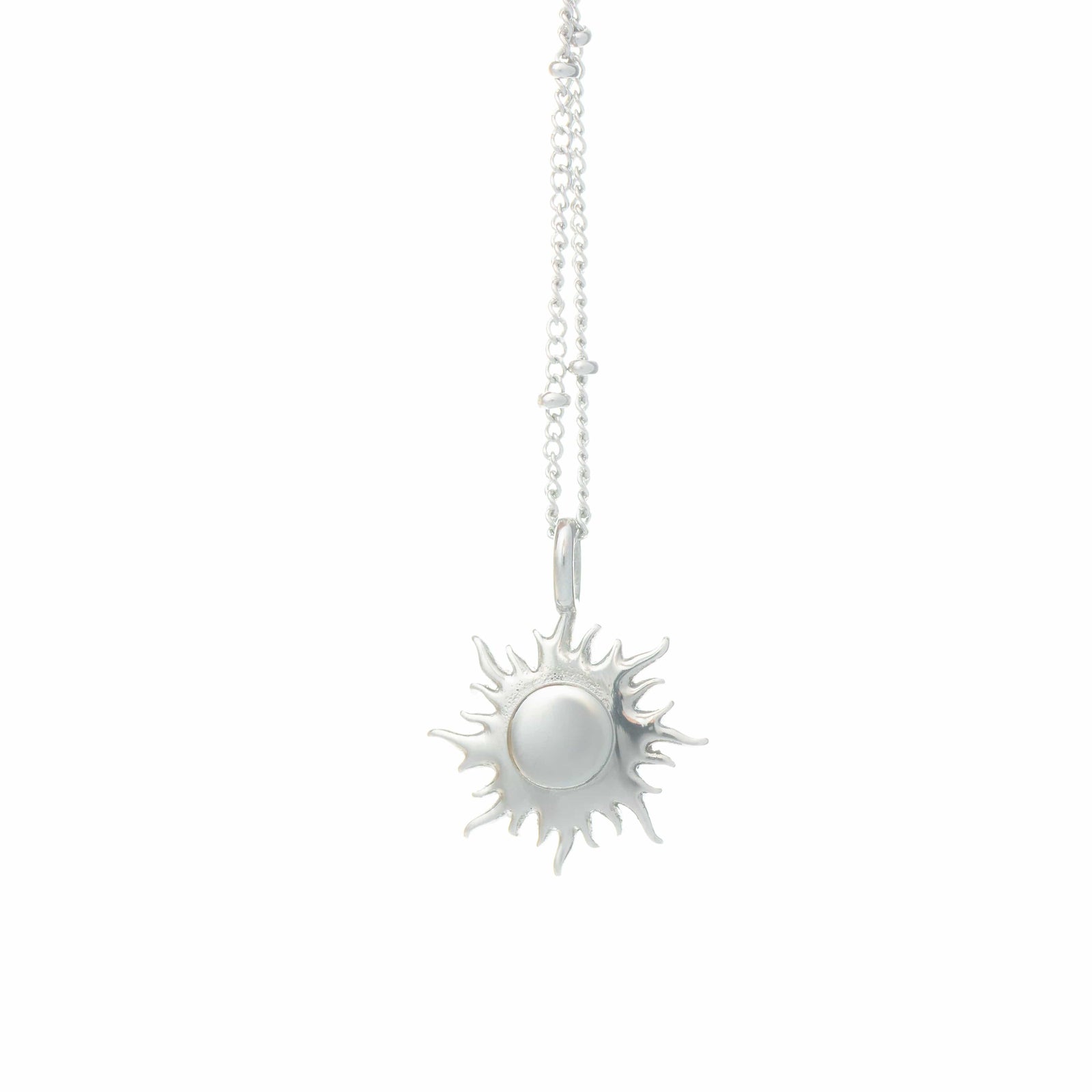 Silver sunshine charm hanging from a silver beaded chain, photographed against a white background.