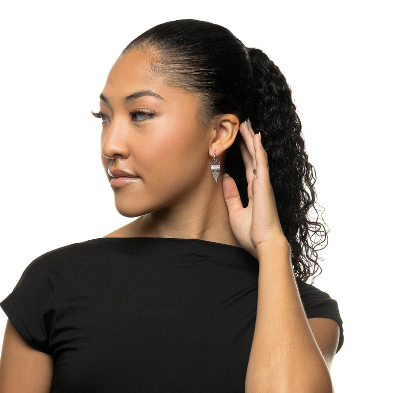 Woman wearing silver Tatreez Earrings