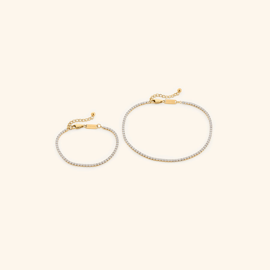 18k gold-plated Tennis Set featuring the Tennis Bracelet and Tennis Anklet.