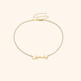 18k gold-plated Tennis Name Necklace featuring a clear pavé crystal chain with a central custom Arabic calligraphy nameplate.