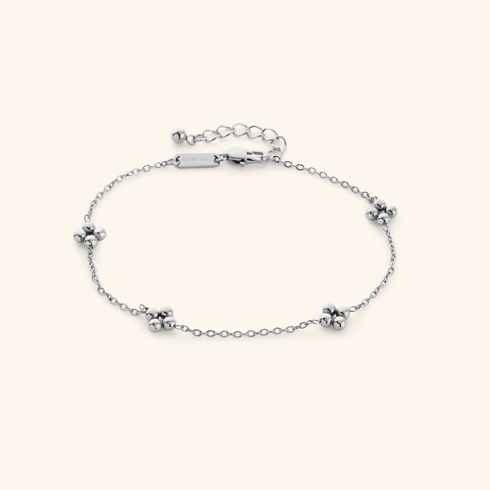 Silver Dotted Henna Anklet product-only shot on a cream background, featuring a delicate chain with evenly spaced dotted floral clusters and adjustable clasp.