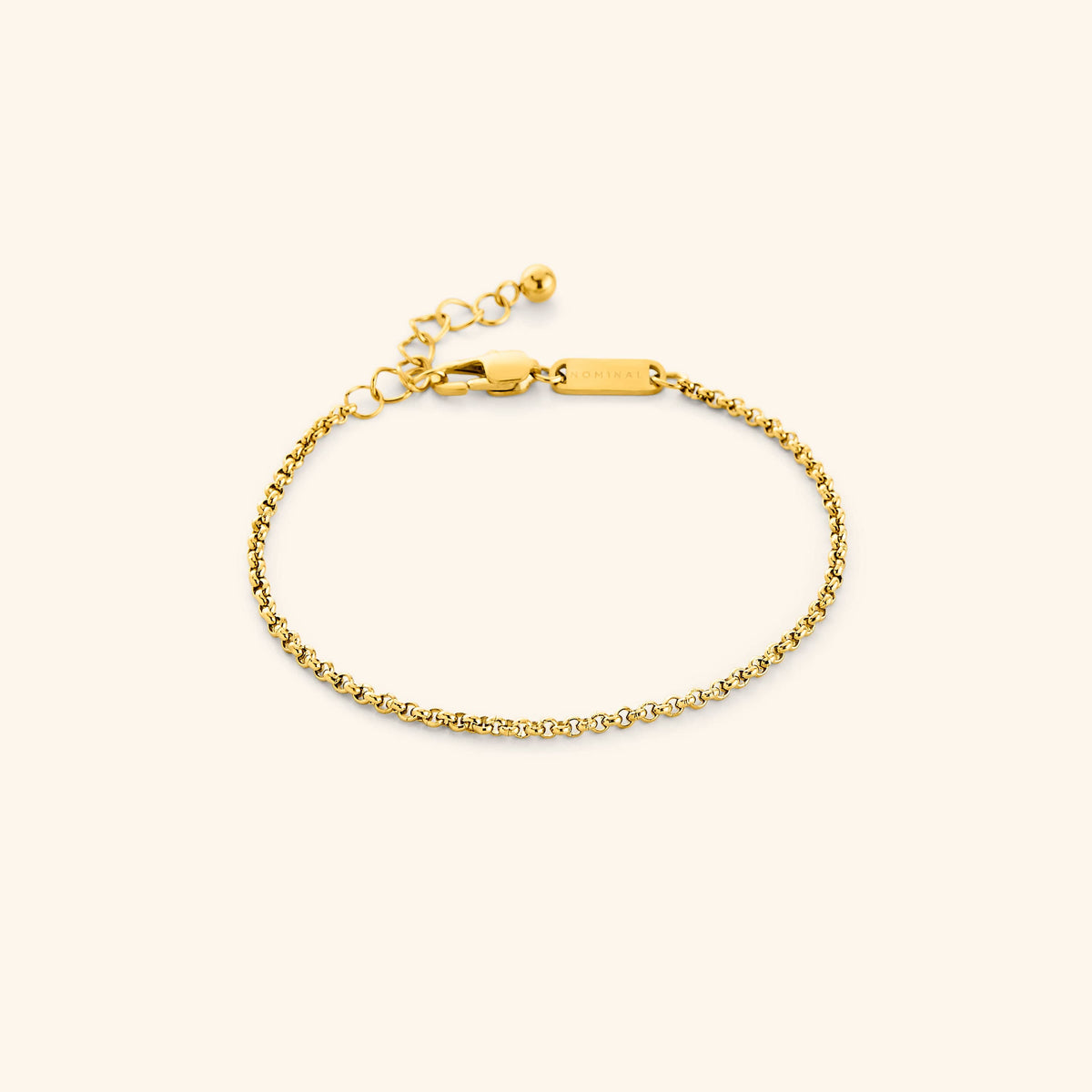 Photo of the gold Micro Box Bracelet. This bracelet features a 1.5MM alternating box-like chain pattern.