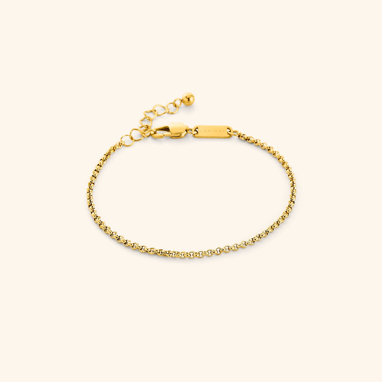 Photo of the gold Micro Box Bracelet. This bracelet features a 1.5MM alternating box-like chain pattern.