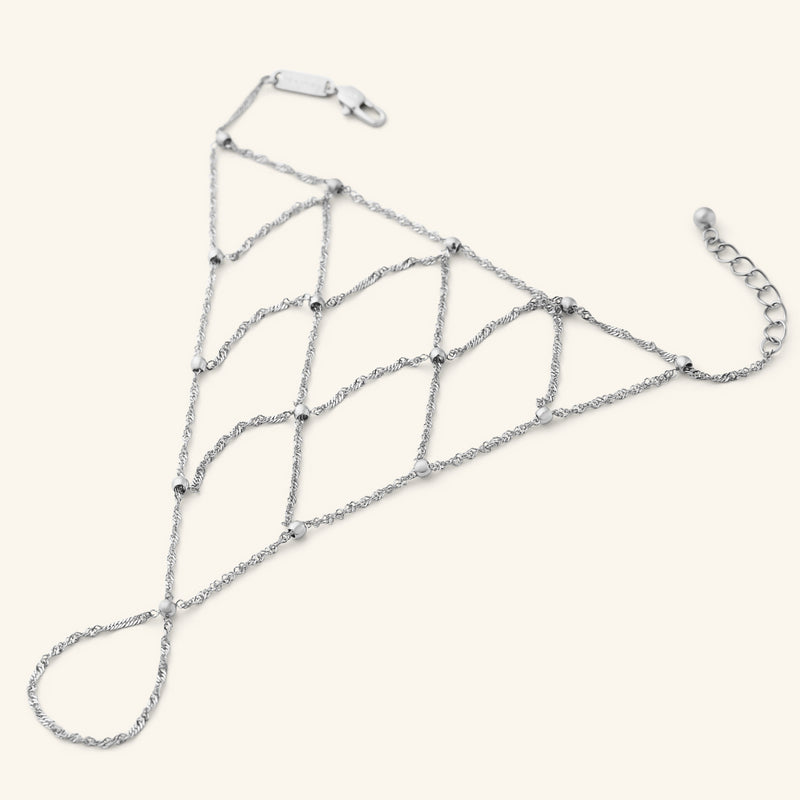 Silver Keffiyeh Fishnet Hand Chain with a lattice-style chain pattern and small bead accents.