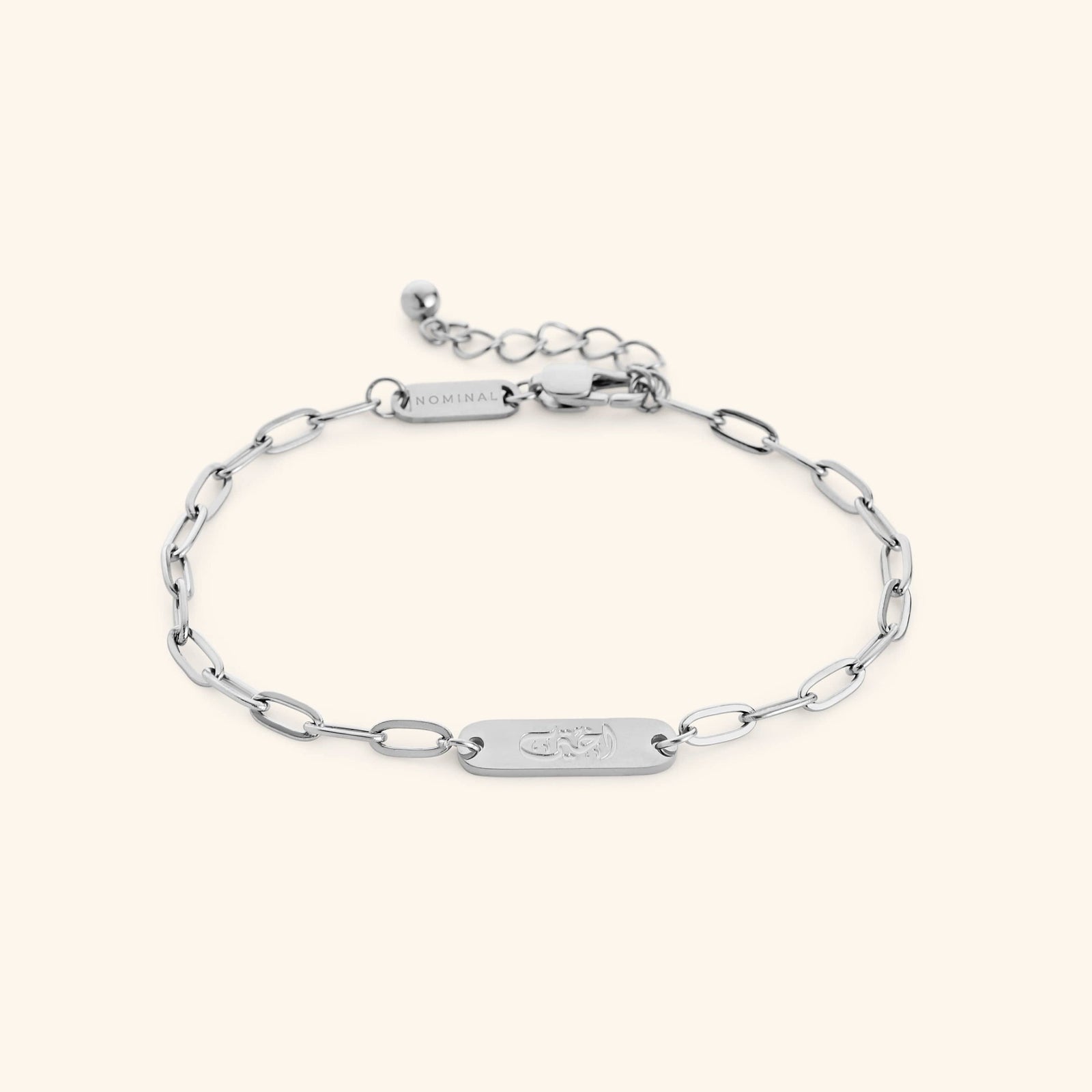 Silver My Sister Ukhti link bracelet showing the Arabic engraving on center tag, photographed against a light background.