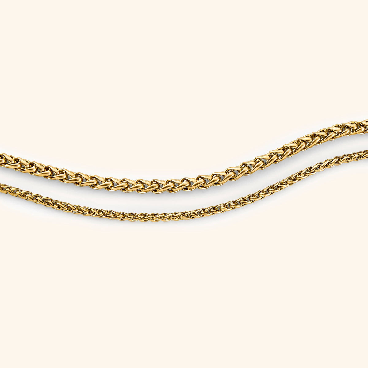Photo of the gold Wheat Chain Bracelet | Women in two different thickness.