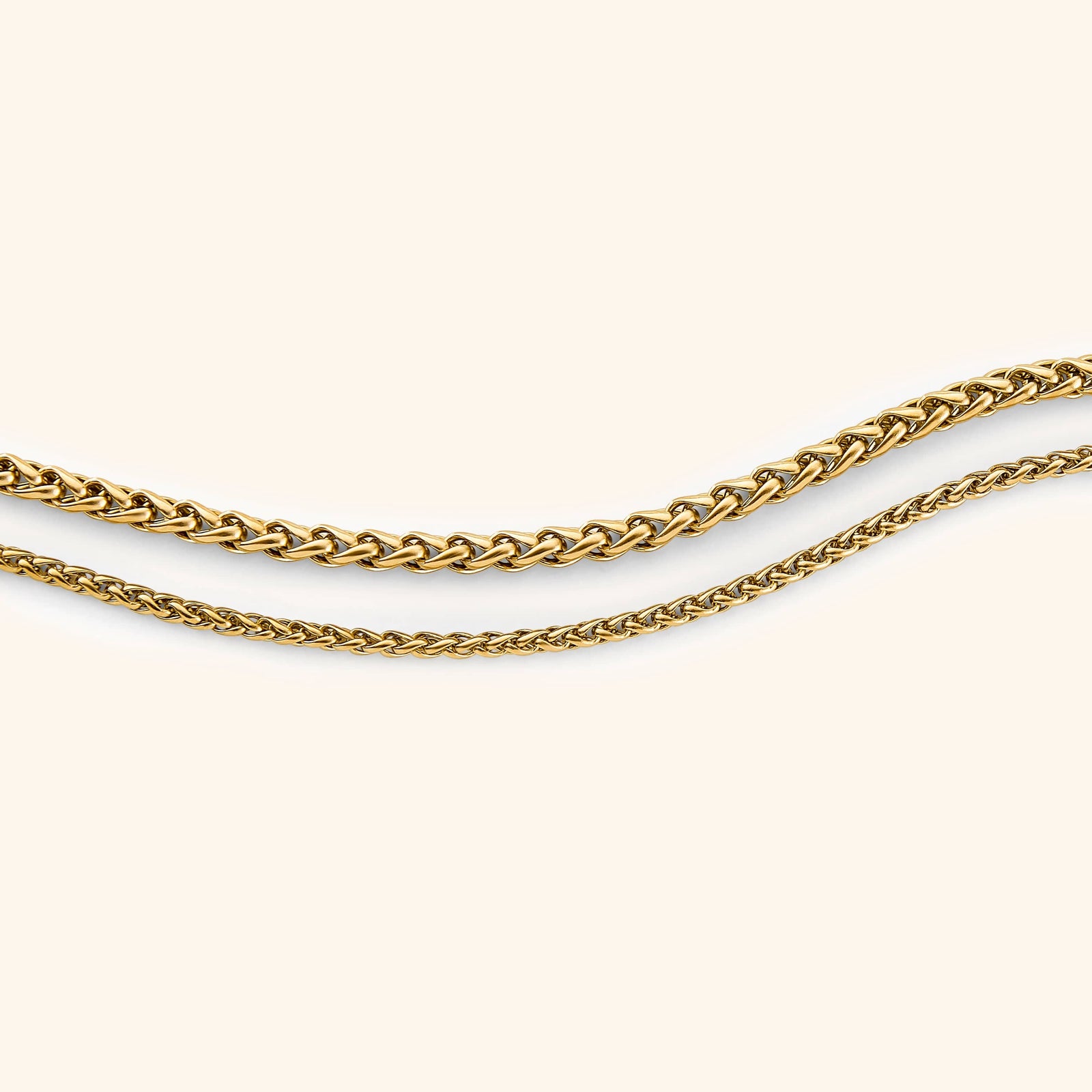 Photo of the gold Wheat Chain Bracelet | Women in two different thickness.