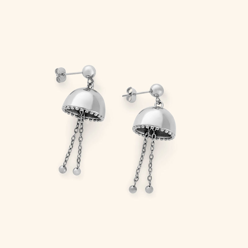 Silver Jhumka Earrings with dome-shaped tops and two dangling chain drops ending in small silver spheres.