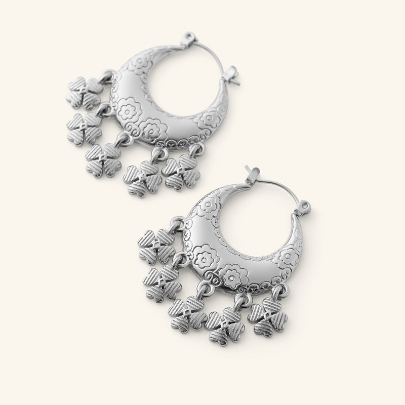 Silver Levantine Garden Hoop Earrings with floral engraving and dangling charms.