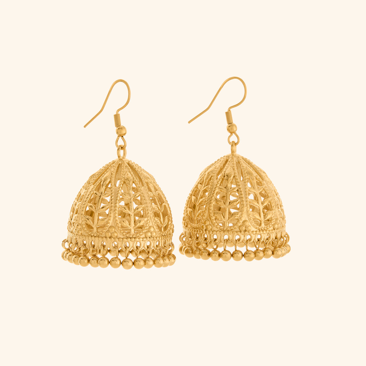 The Olive Branch Jhumka Earrings by Nominal, crafted with an 18k gold-plated finish featuring intricate openwork olive branch motifs and a fringe of dangling gold beads, displayed on an off-white background