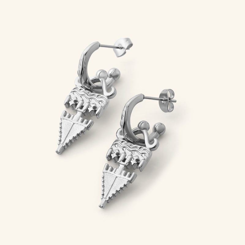 Silver Tatreez Earrings featuring textured geometric drops hanging from engraved hoop studs pimage_ shown against a neutral background.