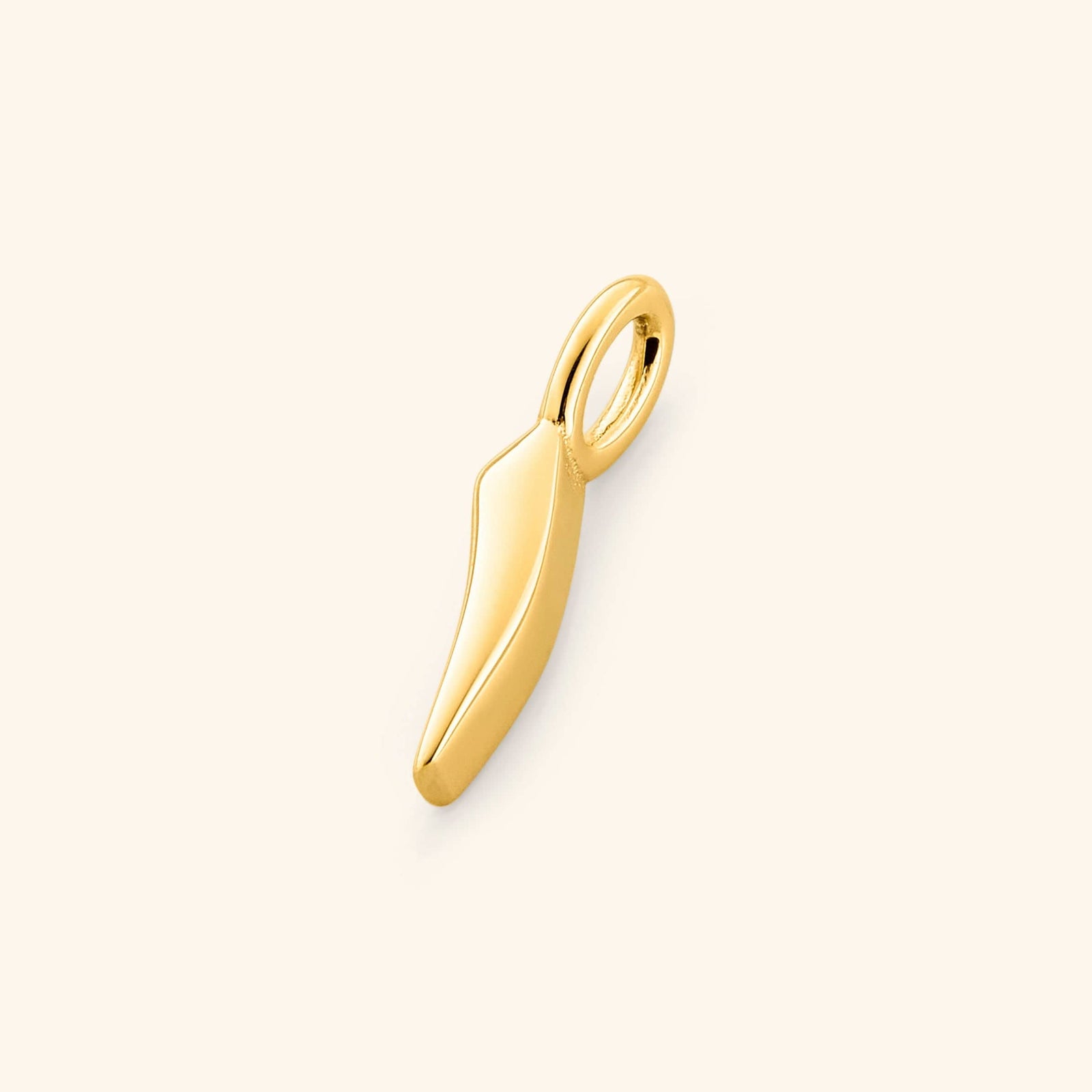 Close-up of the gold-plated Arabic number charm "1" ( featuring the same pearl backdrop and smooth finish.