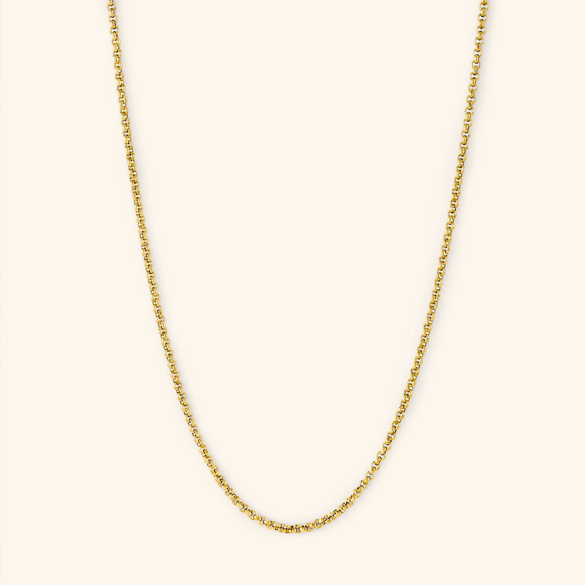 Photo of an 18k gold plated necklace against a light background. The Invisible Box Bracelet features a 1.5MM alternating box-like chain pattern